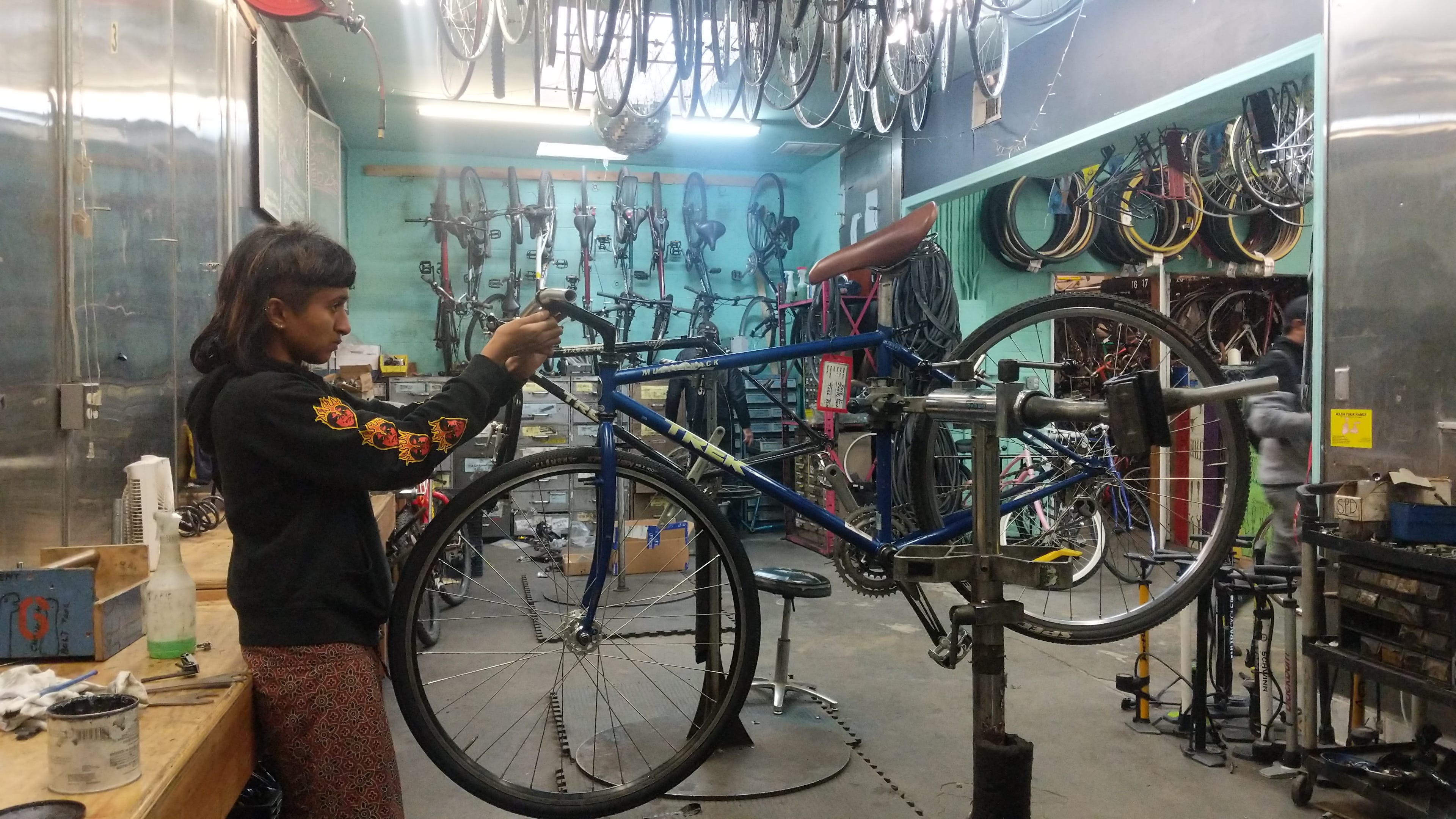 Snays working on her bike